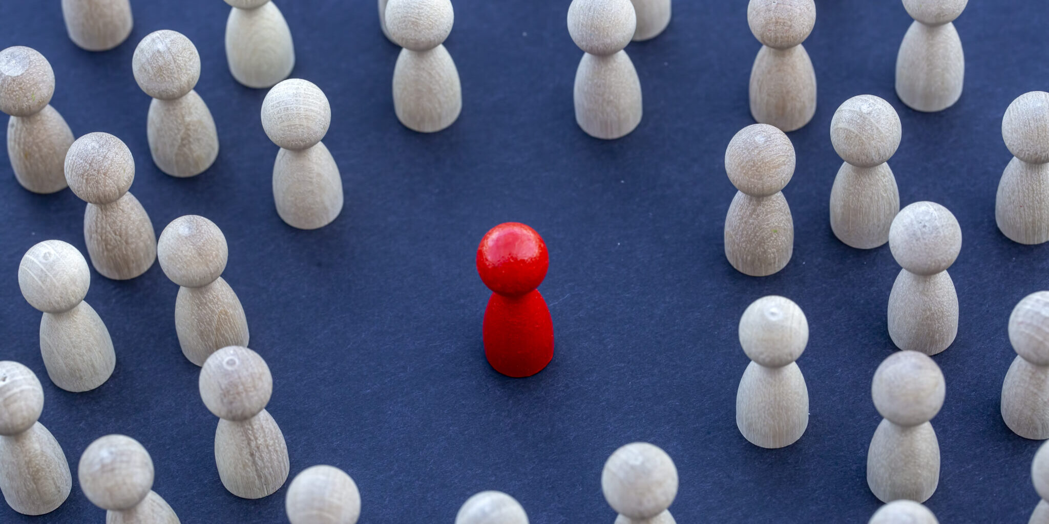 To be different, to be a leader, to lead. icon expression with c To be different, to be a leader, to lead. icon expression with colorful wooden figures. Teamwork concept, Wooden Stick Figures team. Teamwork concept, Wooden Stick Figures team.